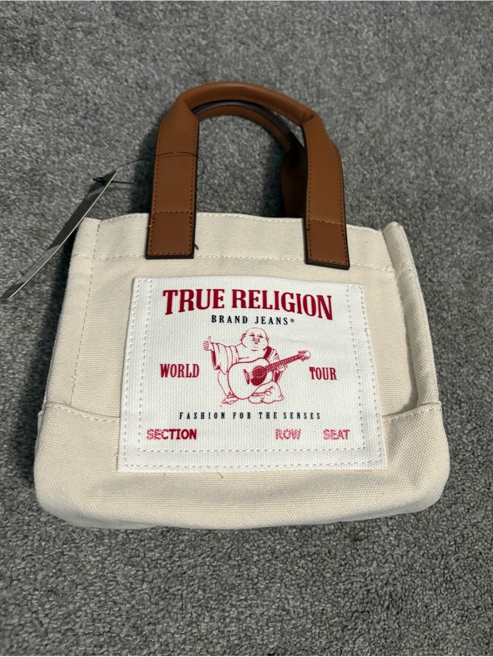 True Religion Cream Canvas Mini Tote with Brown Top Handles and Red Logo Patch